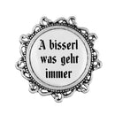 Gaudiknopf "A bisserl was geht immer" verziert