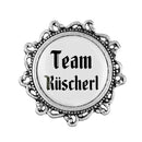 Gaudiknopf "Team Rüscherl" verziert